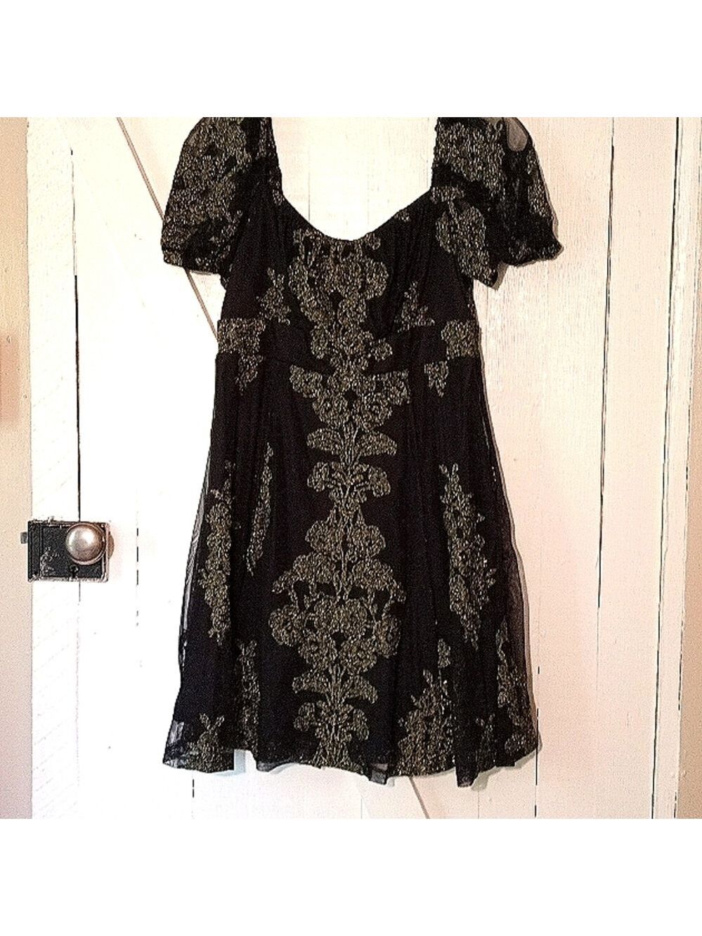 Altar'd State NWT black with gold design dress size medium.